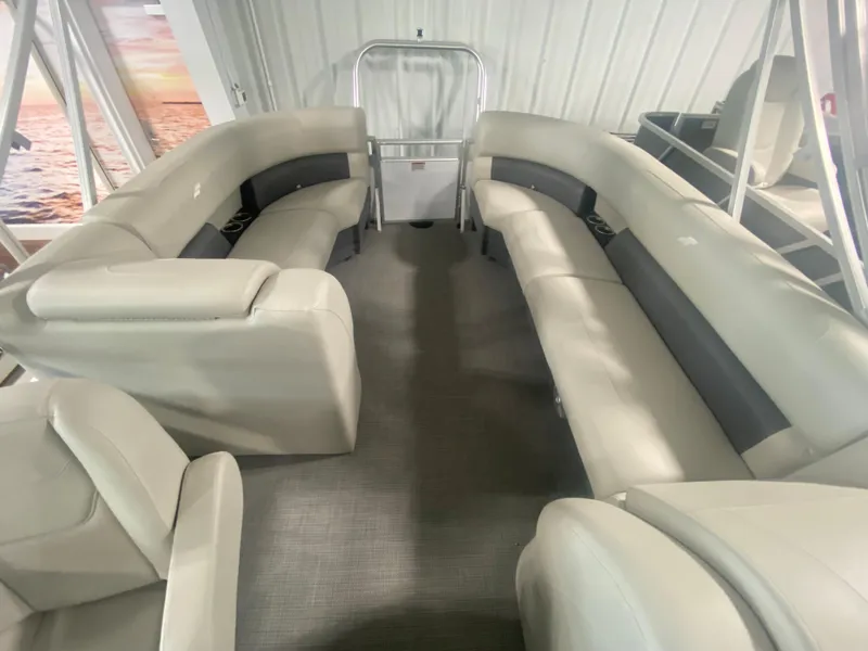Slide: The Image of 2023 Starcraft LX22 R pontoon boat interior with spacious seating. - 11