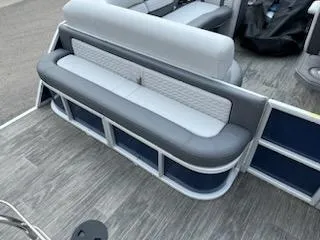 Slide: The Image of 2023 Godfrey Monaco 235C Back Porch boat seating area with gray and white upholstery. - 11