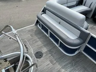 Slide: The Image of 2023 Godfrey Monaco 235C Back Porch, luxury pontoon boat seating and deck area. - 3