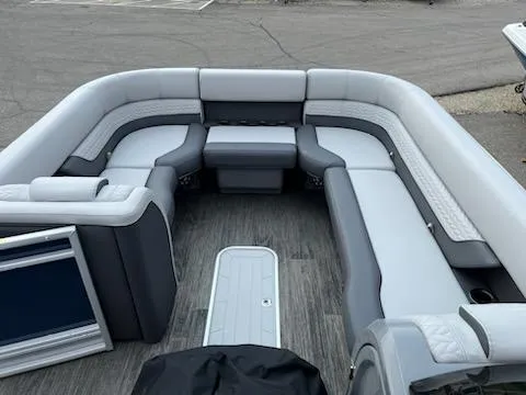 Slide: The Image of 2023 Godfrey Monaco 235C Back Porch boat interior with spacious seating and modern design. - 5