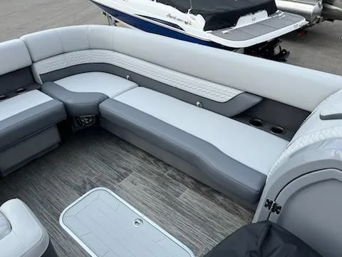 Slide: The Image of 2023 Godfrey Monaco 235C Back Porch interior with gray and white seating. - 6