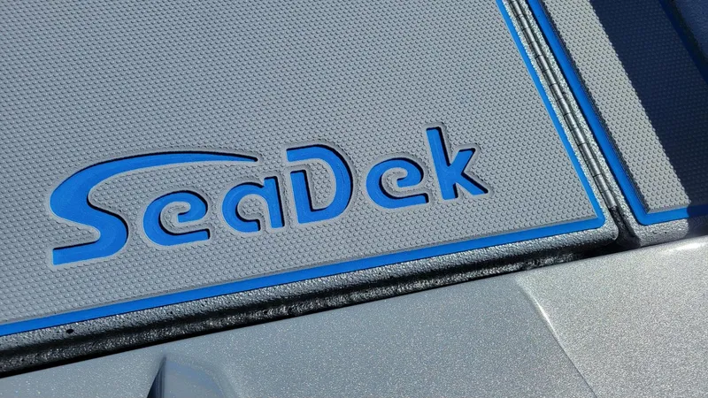 Slide: The Image of SeaDek logo on Xpress H17C boat, 2025 model, featuring Yamaha Vmax 90 engine. - 14