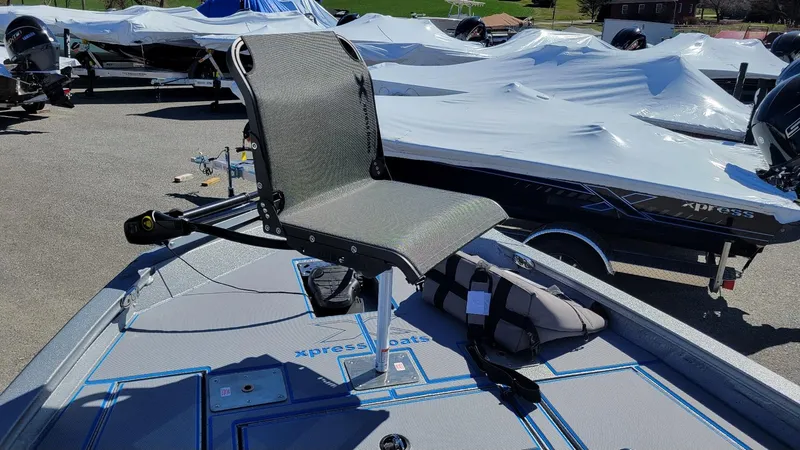 Slide: The Image of 2025 Xpress H17C Crappie boat with Yamaha Vmax 90, featuring a fishing seat. - 15