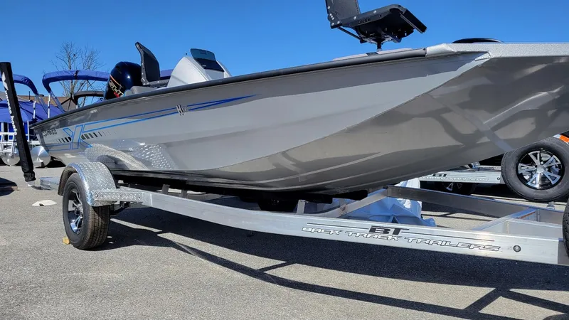Slide: The Image of 2025 Xpress H17C Crappie boat with Yamaha Vmax 90 on trailer. - 3
