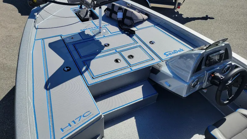 Slide: The Image of 2025 Xpress H17C Crappie boat interior with Yamaha Vmax 90, featuring SeaDek flooring. - 4