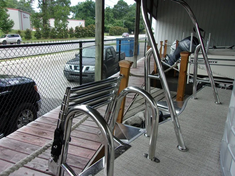 Slide: The Image of 2023 Berkshire CTS Series 24RFX CTS boat with stainless steel railing. - 32