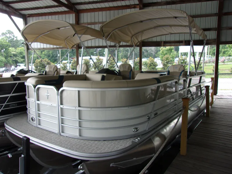 Slide: The Image of 2023 Berkshire CTS Series 24RFX pontoon boat under cover. - 38