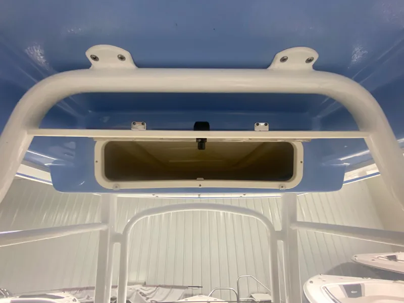 Slide: The Image of 2024 Robalo R222 boat storage compartment. - 10