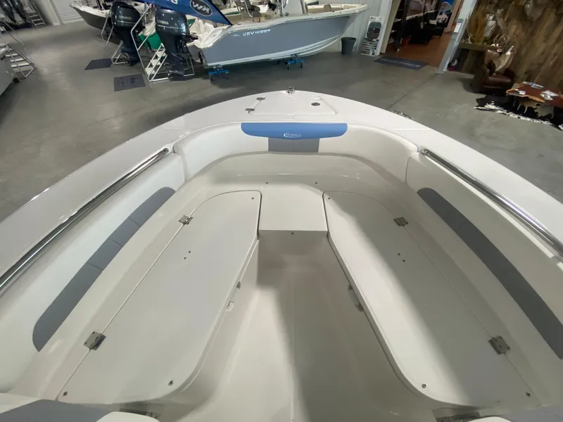 Slide: The Image of 2024 Robalo 202 EXPLORER boat interior, spacious seating, and sleek design. - 9