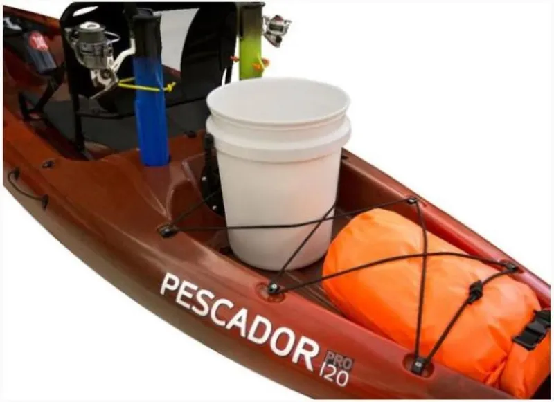Slide: The Image of Perception Kayaks Pescador Pro 12, 2023 model, with fishing gear and storage bucket. - 9