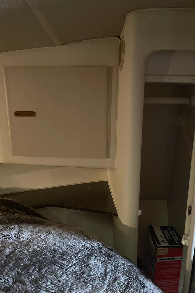 Slide: The Image of Interior storage area of a 1993 Wellcraft St Tropez 3200 boat. - 32