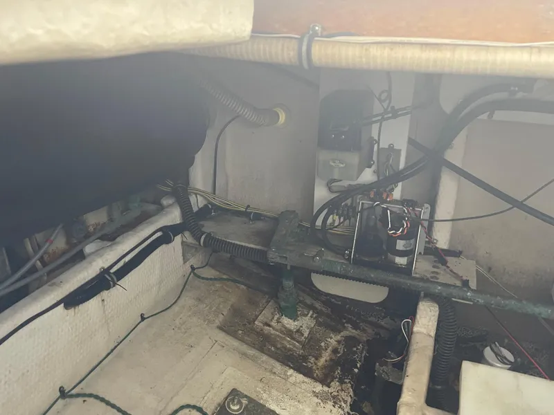 Slide: The Image of Engine compartment of a 1993 Wellcraft St Tropez 3200 boat showing wiring and components. - 8