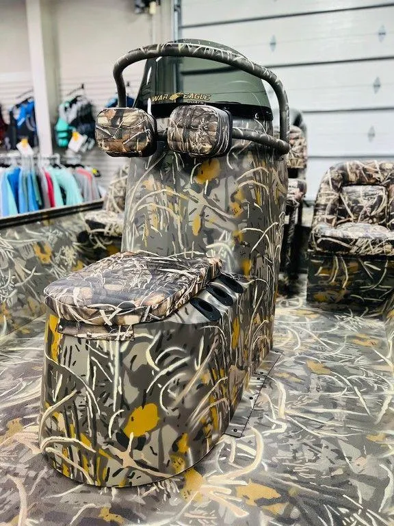 Slide: The Image of 2025 War Eagle Blackhawk 2170 boat with camouflage design in showroom. - 6