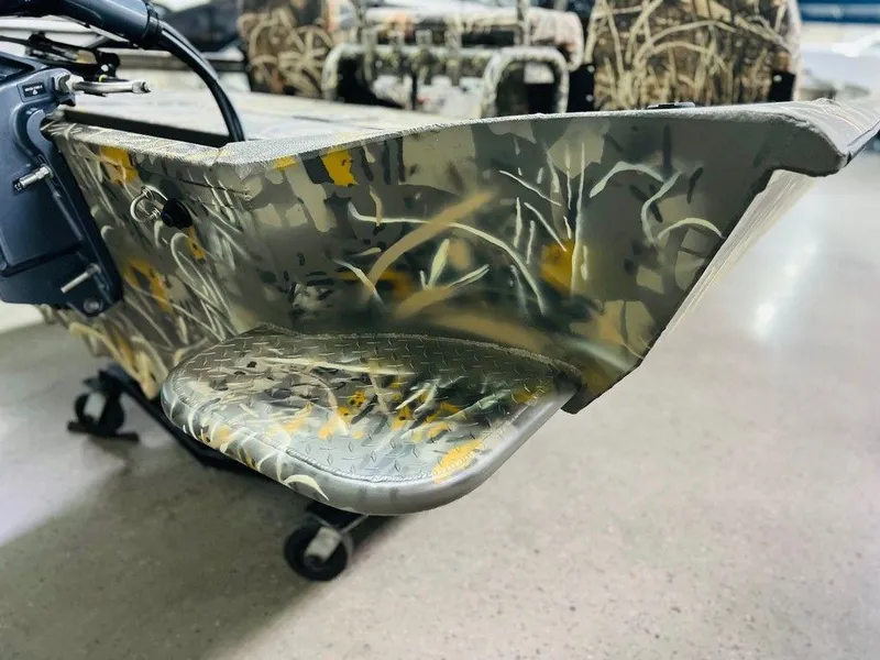 Slide: The Image of 2025 War Eagle Blackhawk 2170 boat with camouflage design, showcasing detailed craftsmanship. - 8