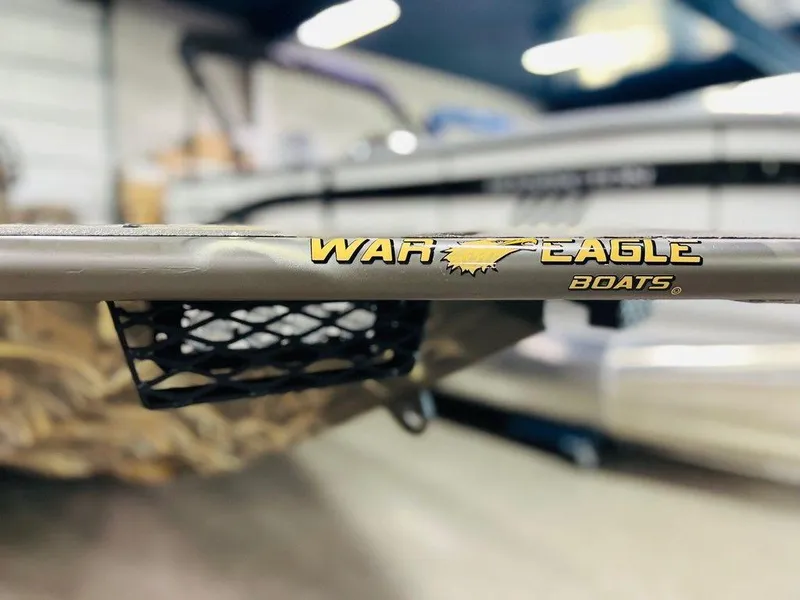 Slide: The Image of War Eagle Blackhawk 2170 boat detail, showcasing logo and design, 2025 model. - 9