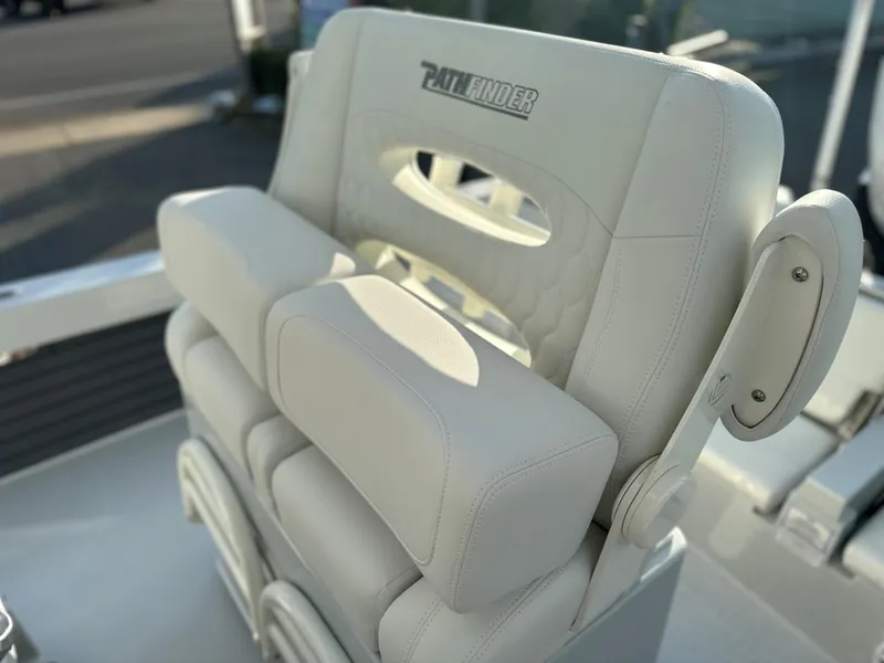 Slide: The Image of 2025 Pathfinder 2600 TRS boat seat with white cushioned upholstery. - 10