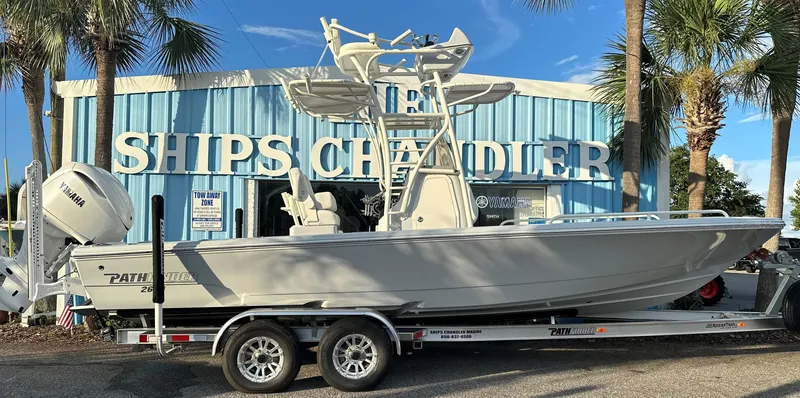 Slide: The Image of 2025 Pathfinder 2600 TRS boat on trailer outside Ships Chandler store. - 5