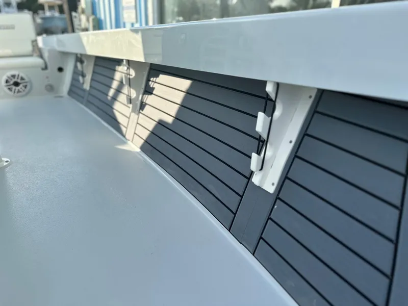 Slide: The Image of 2025 Pathfinder 2600 TRS boat interior with sleek, modern design and storage compartments. - 6