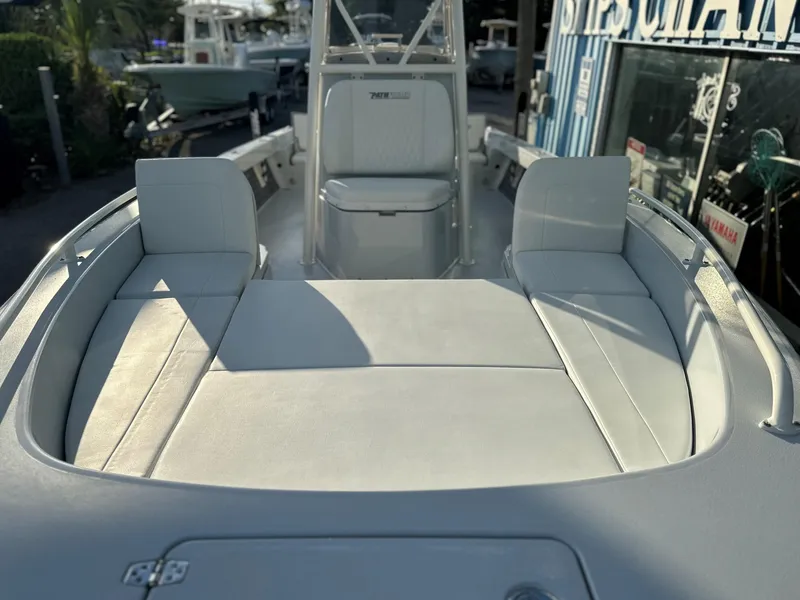 Slide: The Image of 2025 Pathfinder 2600 TRS boat interior with cushioned seating and backrests. - 8