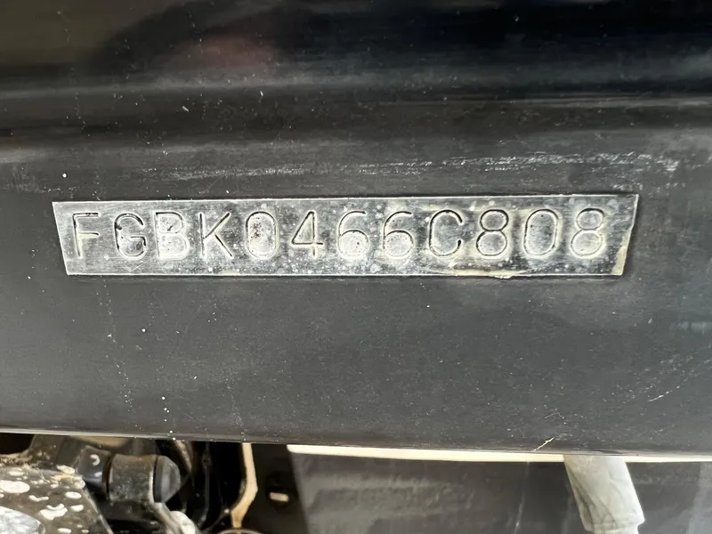 Slide: The Image of 2008 Chaparral Signature 250 hull identification number (HIN) plate close-up. - 13