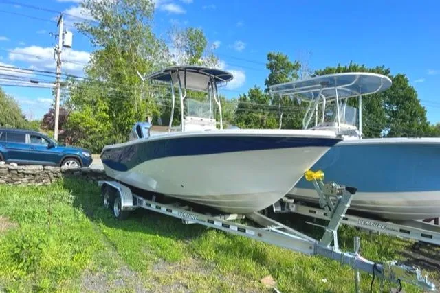 Slide: The Image of 2023 Sea Chaser 22 HFC boat on a trailer, parked outdoors. - 3
