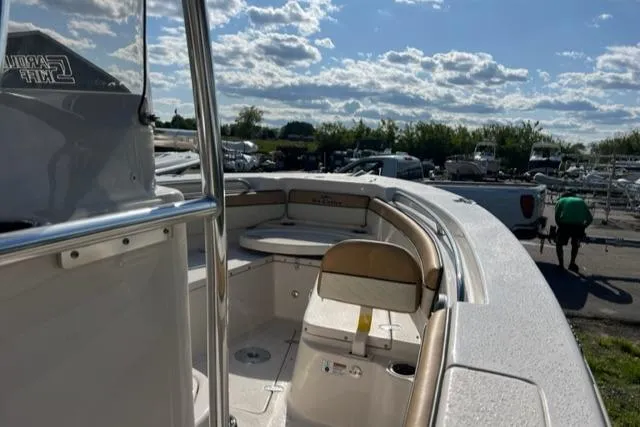 Slide: The Image of 2023 Sea Chaser 22 HFC boat interior with seating and storage compartments. - 9