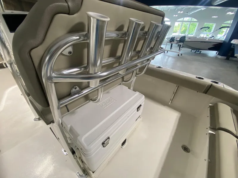 Slide: The Image of 2024 Key West 219 FS boat interior with rod holders and cooler. - 10