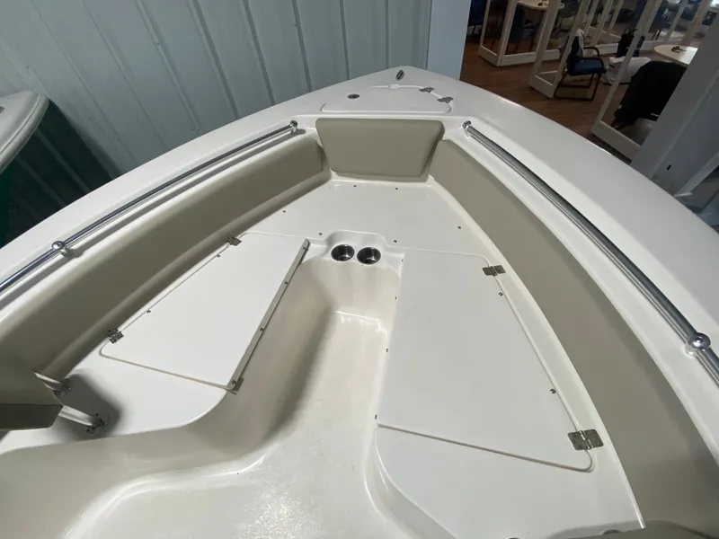 Slide: The Image of 2024 Key West 219 FS boat bow with seating and storage compartments. - 18
