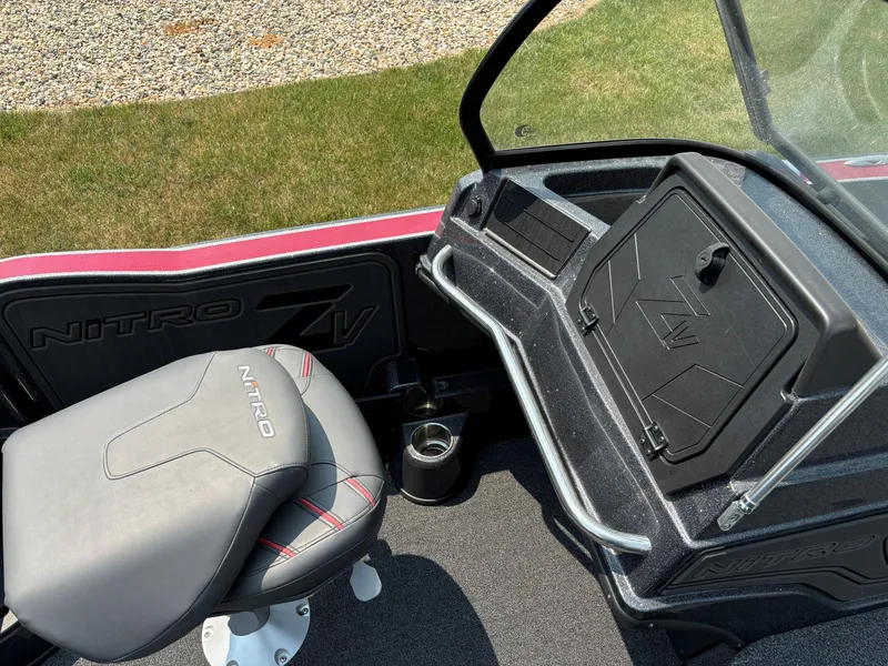 Slide: The Image of 2023 Nitro ZV20 Pro boat interior with seat and storage compartment. - 11