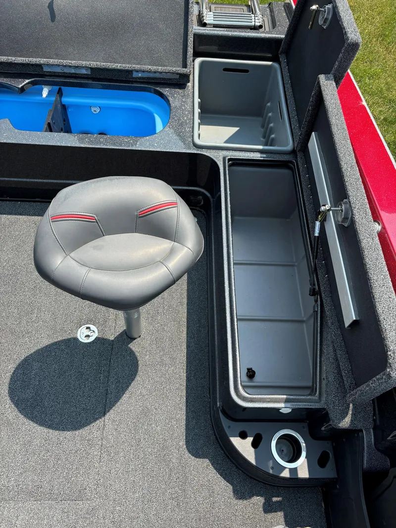 Slide: The Image of 2023 Nitro ZV20 Pro boat interior with storage compartments and seat. - 12