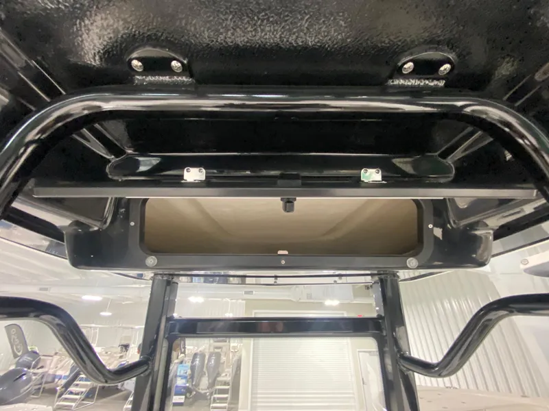 Slide: The Image of 2024 Robalo 246 Cayman boat interior storage compartment. - 11
