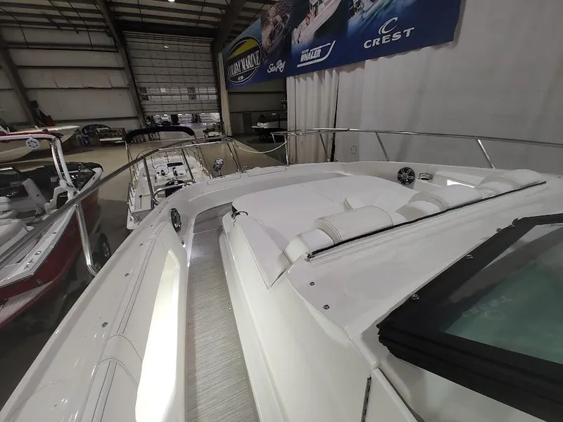 Slide: The Image of 2020 Sea Ray Sundancer 320 in a boat showroom. - 16