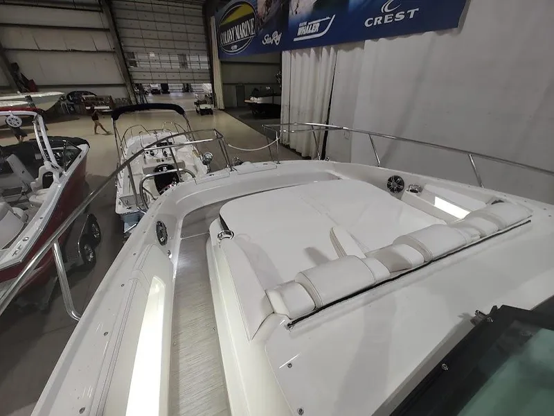 Slide: The Image of 2020 Sea Ray Sundancer 320 in a boat showroom. - 17