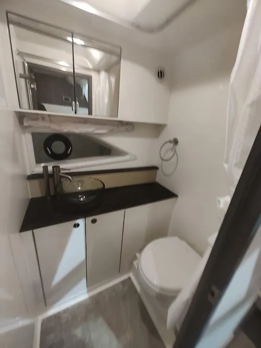 Slide: The Image of Interior view of Sea Ray Sundancer 320 yacht bathroom, year 2020. - 27