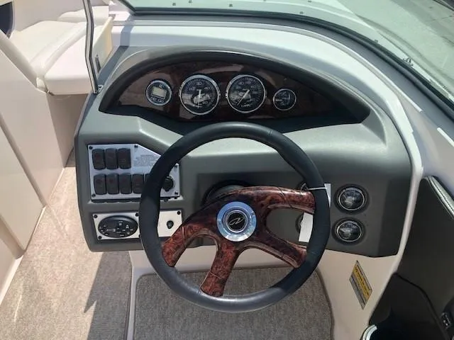 Slide: The Image of Dashboard of a 2004 Regal 2200 Bowrider boat. - 15