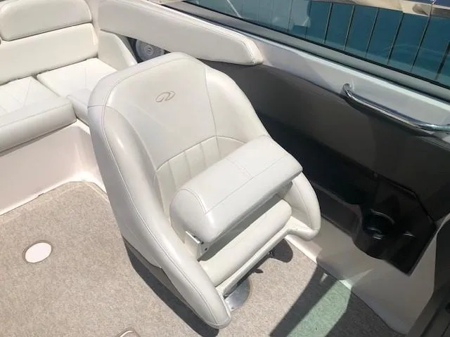 Slide: The Image of Interior of a 2004 Regal 2200 Bowrider with beige seating. - 20