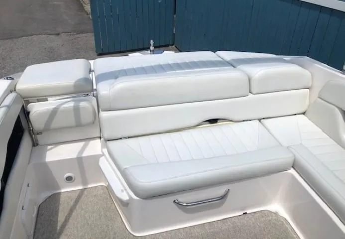 Slide: The Image of Interior of a 2004 Regal 2200 Bowrider with white upholstery. - 23
