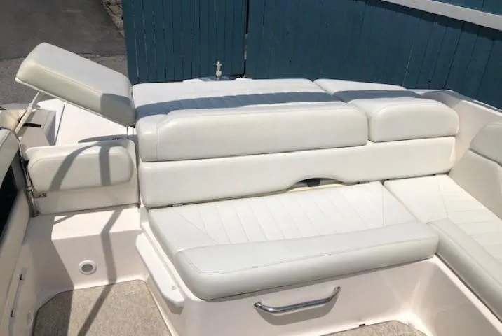 Slide: The Image of Interior of 2004 Regal 2200 Bowrider with white upholstery. - 24