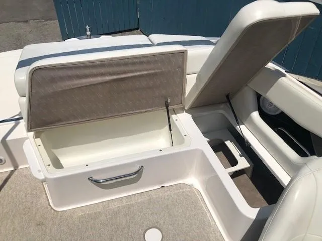 Slide: The Image of Regal 2200 Bowrider 2004, open storage compartment in boat. - 25