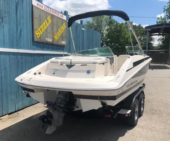 Slide: The Image of 2004 Regal 2200 Bowrider boat on trailer, Sizzle Marine. - 3
