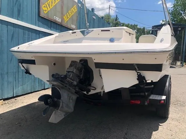 Slide: The Image of 2004 Regal 2200 Bowrider boat on trailer, rear view. - 4