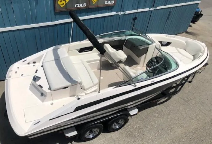 Slide: The Image of 2004 Regal 2200 Bowrider boat on trailer, side view. - 6
