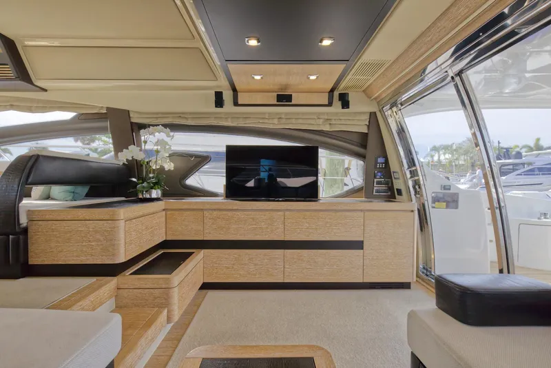 Slide: The Image of Luxurious interior of a 2015 Azimut 64 Flybridge yacht with modern furnishings. - 21