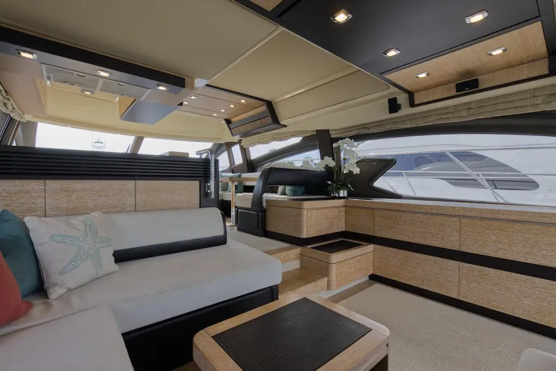 Slide: The Image of Luxurious interior of a 2015 Azimut 64 Flybridge yacht with modern furnishings. - 23