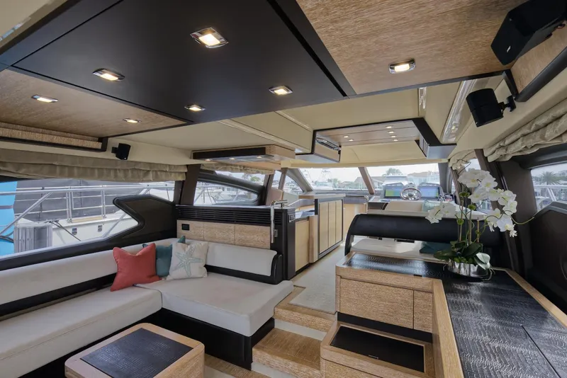 Slide: The Image of Luxurious interior of a 2015 Azimut 64 Flybridge yacht with modern furnishings. - 24