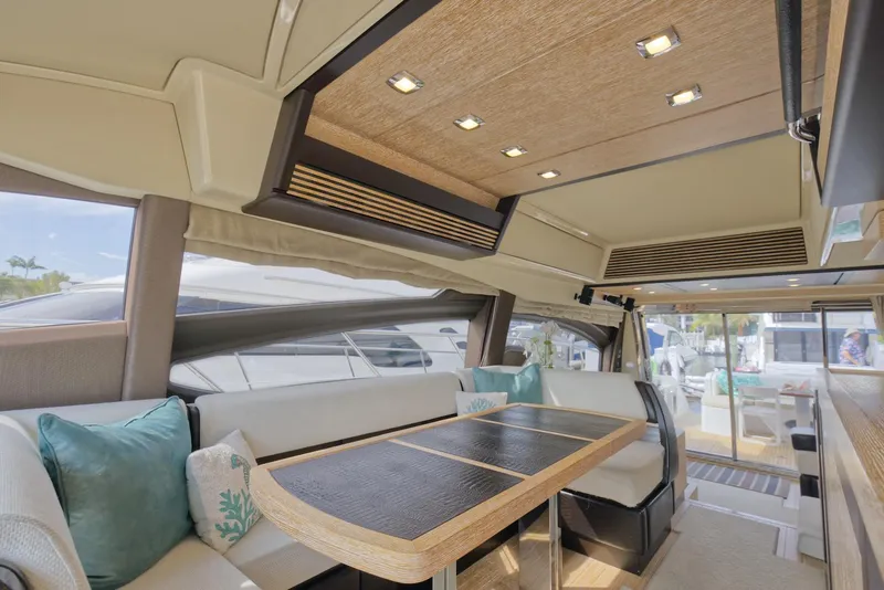 Slide: The Image of Luxurious interior of 2015 Azimut 64 Flybridge yacht with elegant seating and modern lighting. - 27