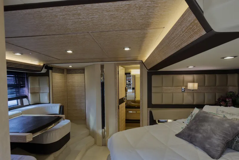 Slide: The Image of Luxurious interior of 2015 Azimut 64 Flybridge yacht with modern furnishings. - 33