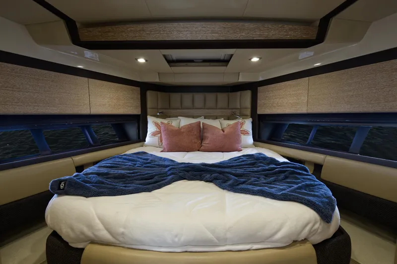 Slide: The Image of Luxurious bedroom in 2015 Azimut 64 Flybridge yacht with cozy bedding and modern design. - 35
