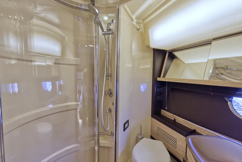 Slide: The Image of Luxurious bathroom in a 2015 Azimut 64 Flybridge yacht with modern fixtures. - 39