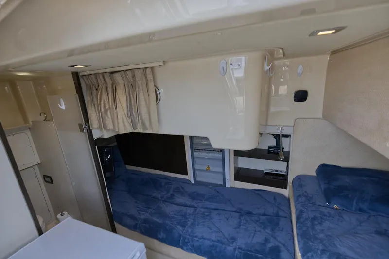 Slide: The Image of Interior cabin of 2015 Azimut 64 Flybridge yacht with twin beds and storage. - 40